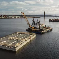 Exemple de l'expertise de Pomerleau dans les travaux maritimes avec des travaux de construction en mer