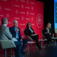 Genevieve Roy speaks at CCM conference.