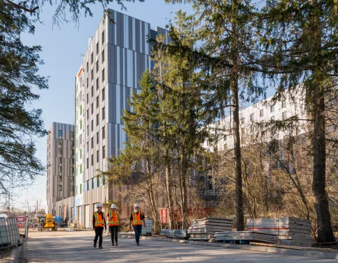 people walking by a building