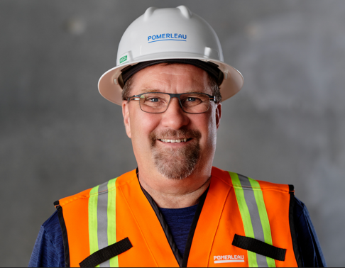 Male construction worker smiling