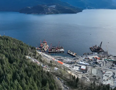 Construction of the Woodfibre LNG project by Pomerleau, a natural gas facility in British Columbia.