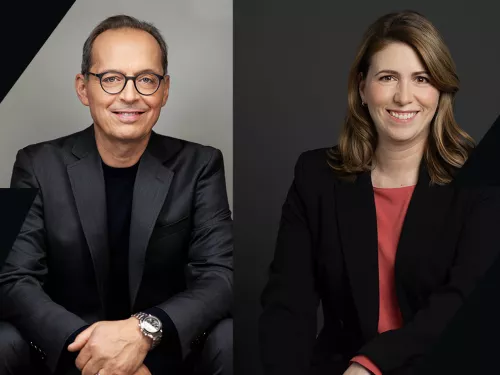 Executive team members smiling