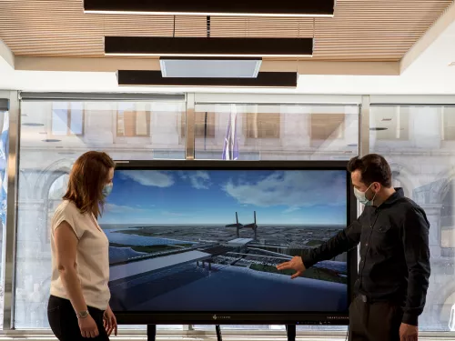 two people in a conference room