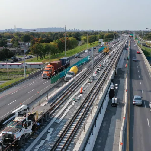 Construction of the REM project, a public transport project by Pomerleau showing the company's expertise in the construction of transport infrastructure