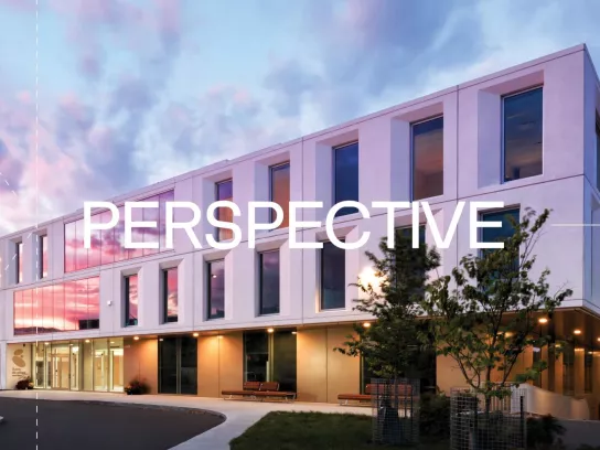 building with word "perspective" written over it
