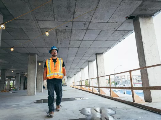 Pomerleau construction worker on a construction site in the Greater Toronto Region in Ontario