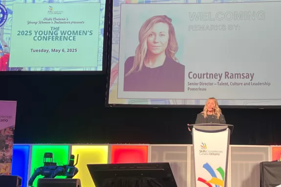 Courtney Ramsay, Senior Director – Talent, Culture, and Leadership at Pomerleau giving the opening remarks at the Young Women’s Conference, organized by Skills Ontario.