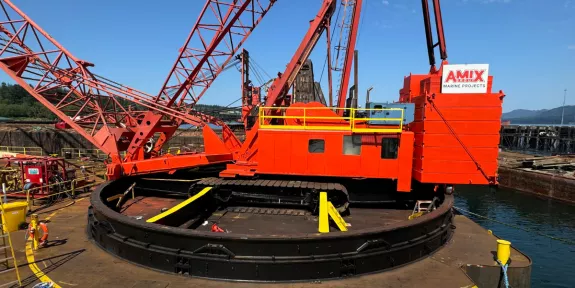 The Arctic Tuk, heavy barge crane used on the construction of the Woodfibre LNG project by Pomerleau. 