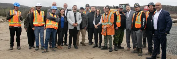 Picture of our team on the construction site of the Nouveau Monde Graphite project built by Pomerleau.