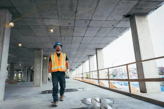 Pomerleau construction worker on a construction site in the Greater Toronto Region in Ontario