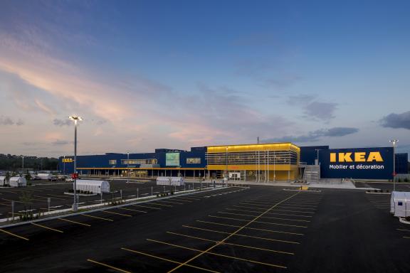 ikea and parking lot at sunset