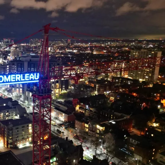 Crane with Pomerleau logo