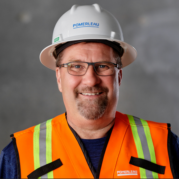 Male construction worker smiling