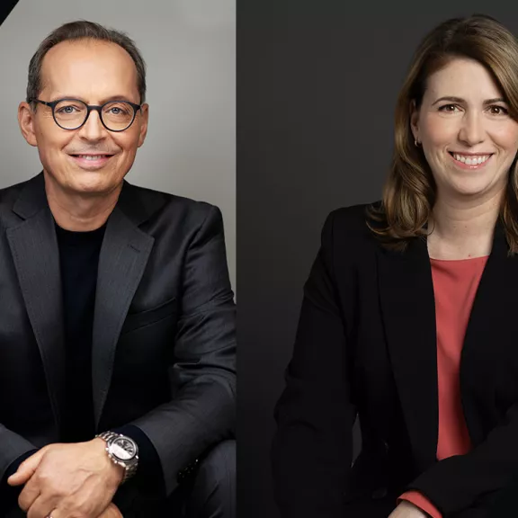 Executive team members smiling