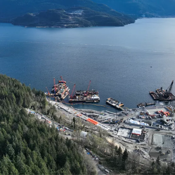 Construction of the Woodfibre LNG project by Pomerleau, a natural gas facility in British Columbia.