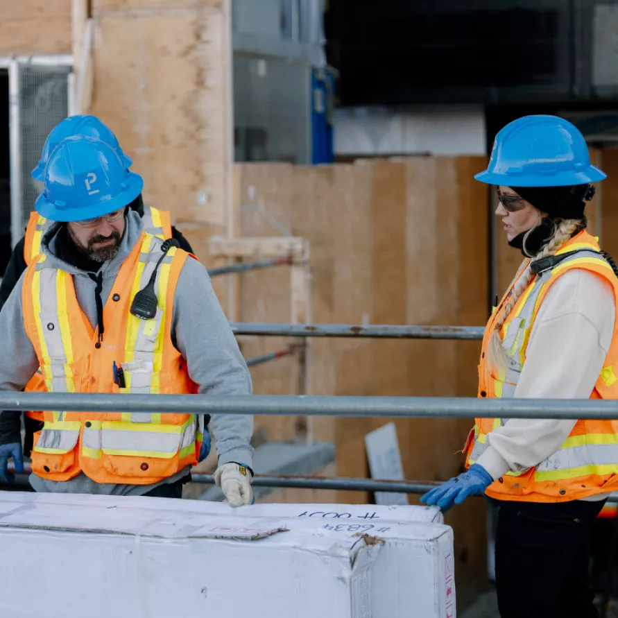 Workers on a construction site, an example of Pomerleau's expertise in data centers construction