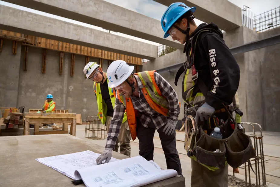 Pomerleau's workers on a construction site.